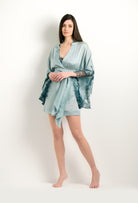 Made of silk and lace, explore the lingerie collection 2024 winter from the house Carine Gilson with this Short Kimono Butterfly Sleeves in grey blue Silk with emerald green lace