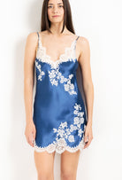 Made of silk and lace, explore the 2026 Cruise collection  from the house Carine Gilson with this Slip Babydoll Style V Neckline in Azur Silk  with Natural lace