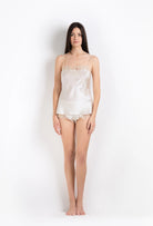 Enter Carine Gilson's world and the most beautiful silk lingerie with the 2026 Summer collection with this camisole straight neckline in ivory silk  with ivory lace