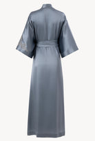 Discover the unique craftmanship of the belgian designer Carine Gilson in her atelier for the Hiver 2026-27 collection with this Long Kimono Classic Sleeves in Blue stone Silk  with Grey lace