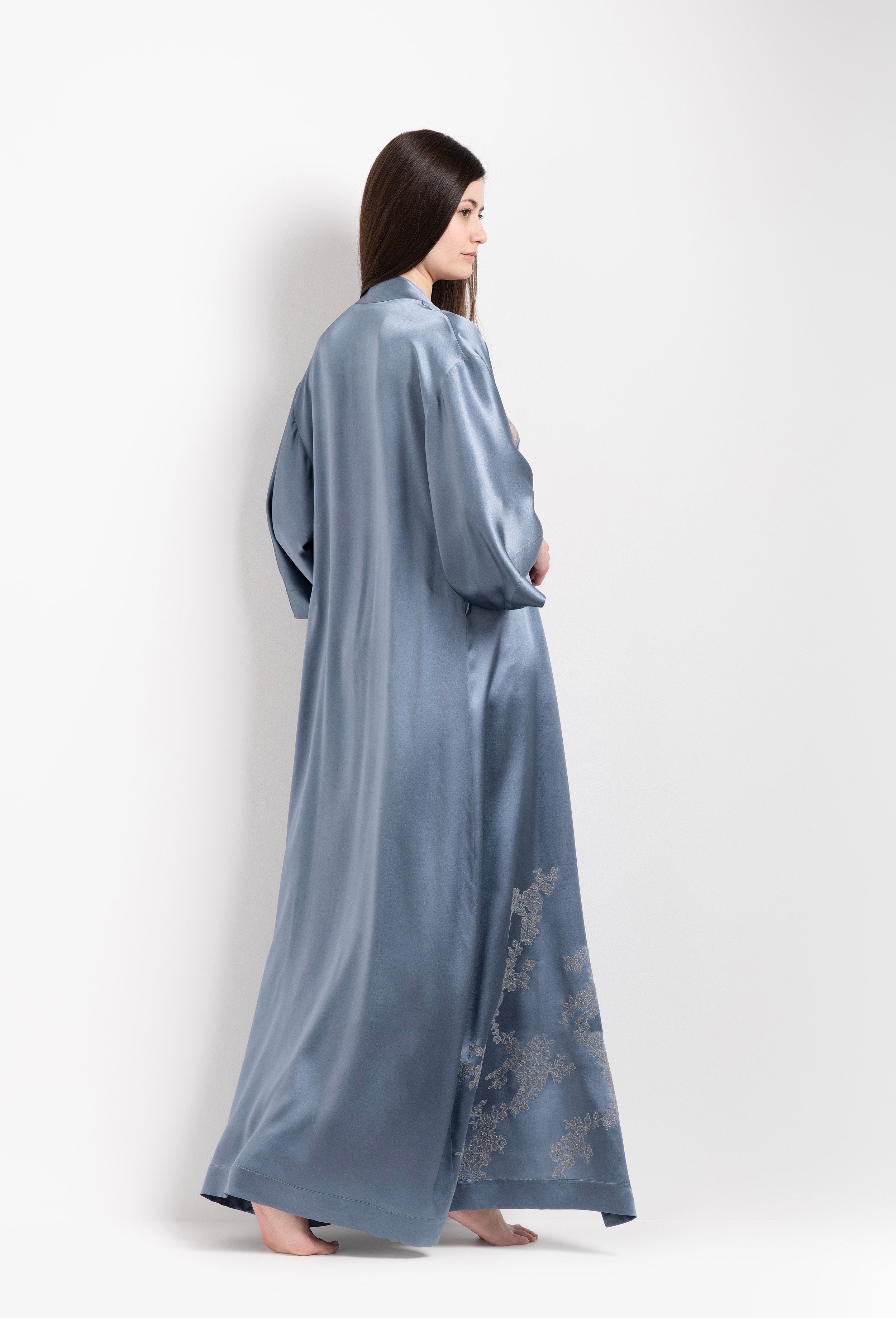 Discover the unique craftmanship of the belgian designer Carine Gilson in her atelier for the Hiver 2026-27 collection with this Long Kimono Classic Sleeves in Blue stone Silk  with Grey lace