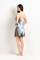 Discover the unique craftmanship of the belgian designer Carine Gilson in her atelier for the 2025 Winter collection with this Slip Straight Neckline in Frozen blue Silk  with Ebony lace