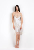 The 2026 Summer collection from the house Carine Gilson - The most beautiful couture silk collection to be discovered with this top with classic neckline in ivory silk  with ivory lace