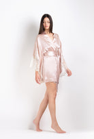 Discover the 2026 Cruise collection of lingerie couture from the house Carine Gilson with this short kimono butterfly sleeves in silverpink silk  with natural lace