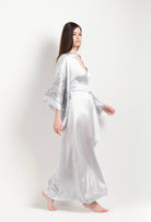 Made of silk and lace, explore the lingerie collection Winter 2026-27 from the house Carine Gilson with this Long Kimono Butterfly Sleeves in Silver print Silk 