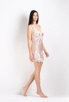 Made of silk and lace, explore the 2026 Cruise collection from the house Carine Gilson with this slip babydoll style v neckline in silverpink silk  with natural lace