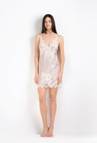 Made of silk and lace, explore the 2026 Cruise collection from the house Carine Gilson with this slip babydoll style v neckline in silverpink silk  with natural lace