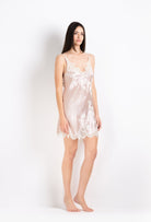 Made of silk and lace, explore the 2026 Cruise collection from the house Carine Gilson with this slip babydoll style v neckline in silverpink silk  with natural lace