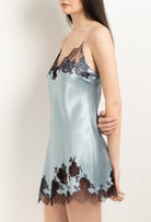 Enter Carine Gilson's world and the most beautiful silk lingerie with the 2025 Winter collection with this Slip Babydoll Style V Neckline in Frozen blue Silk  with Ebony lace