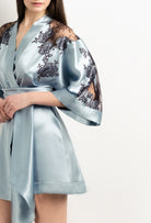 Made of silk and lace, explore the lingerie collection 2025 Winter from the house Carine Gilson with this Short Kimono Classic Sleeves in Frozen blue Silk  with Ebony lace