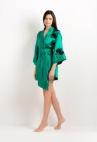 Made of silk and lace, explore the lingerie collection 2025 cruise from the house Carine Gilson with this Mini Kimono in Jade Green Silk  with Black lace