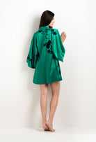 Made of silk and lace, explore the lingerie collection 2025 cruise from the house Carine Gilson with this Mini Kimono in Jade Green Silk  with Black lace