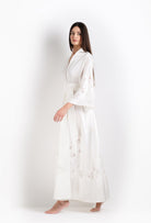 The 2026 Cruise collection from the house Carine Gilson - The most beautiful silk loungewear to be discovered with this long kimono in natural silk  with natural lace