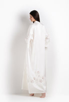 The 2026 Cruise collection from the house Carine Gilson - The most beautiful silk loungewear to be discovered with this long kimono in natural silk  with natural lace