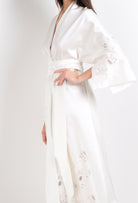 The 2026 Cruise collection from the house Carine Gilson - The most beautiful silk loungewear to be discovered with this long kimono in natural silk  with natural lace