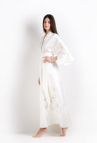 The 2026 Cruise collection from the house Carine Gilson - The most beautiful silk loungewear to be discovered with this long kimono in natural silk  with natural lace