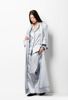 The Winter 2026-27 collection from the house Carine Gilson - The most beautiful couture loungewear to be discovered with this long kimono classic sleeves in Silver grey with contrast details