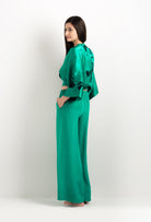 Discover the unique craftmanship of the belgian designer Carine Gilson in her atelier for the 2025 cruise collection with this Kimono Style Cachecoeur Shirt in Jade Green Silk  with Black lace