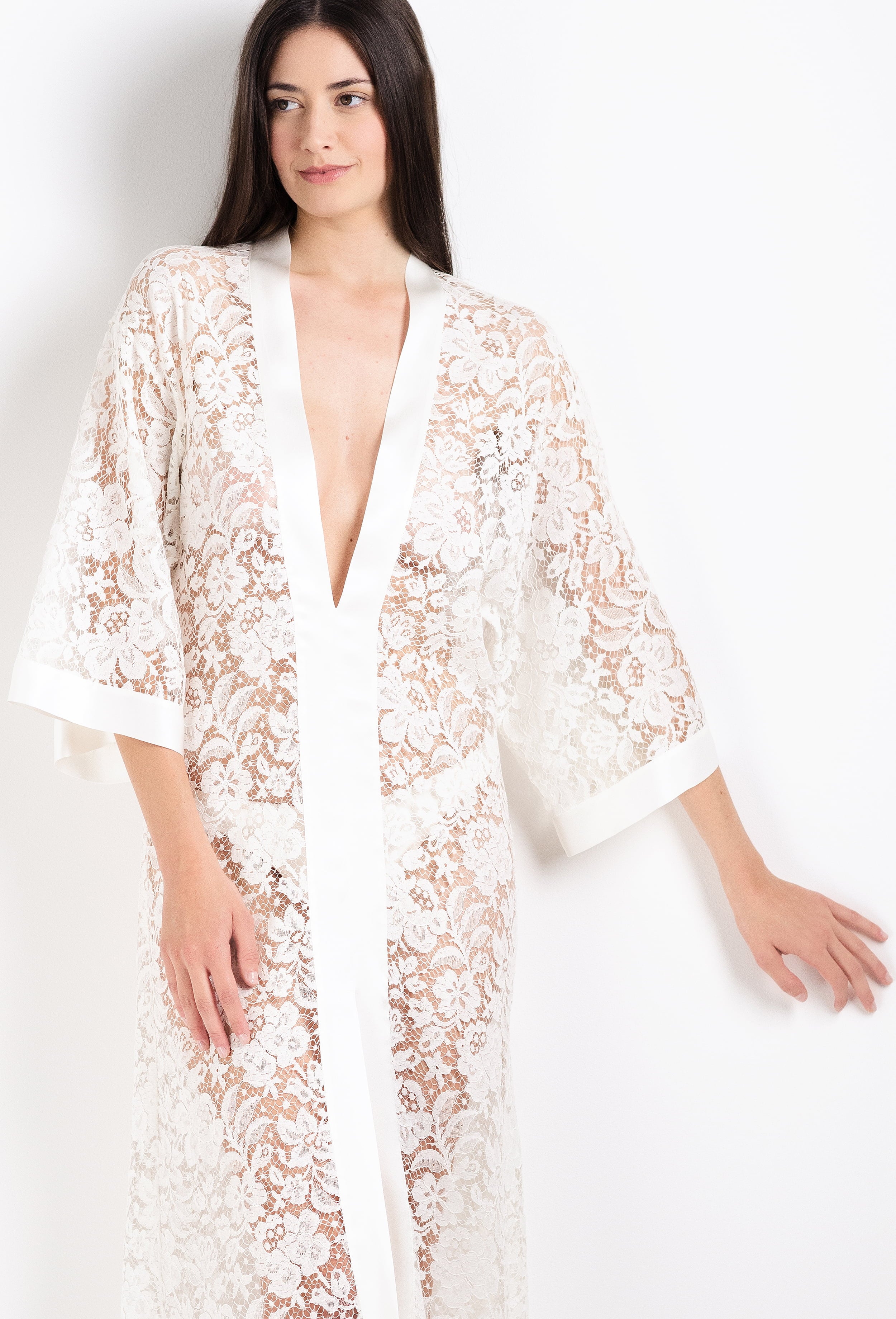 Discover the 2026 Cruise collection of lingerie couture from the house Carine Gilson with this long v neck kaftan in natural silk  with natural lace