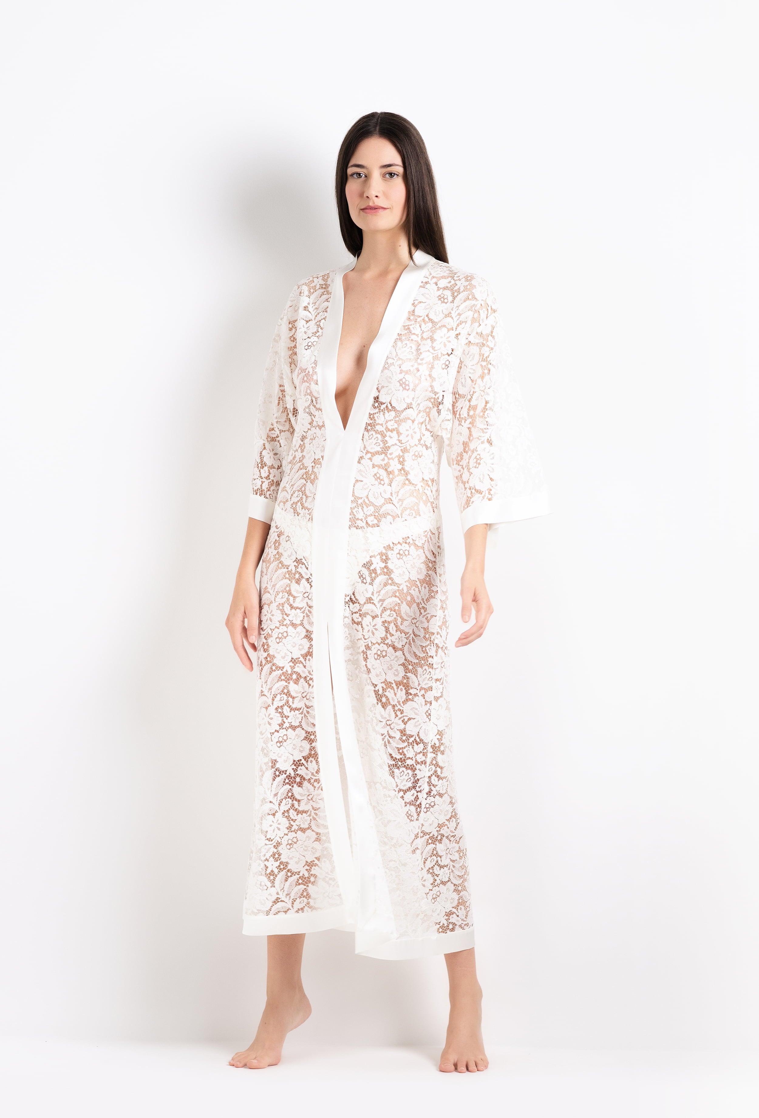 Discover the 2026 Cruise collection of lingerie couture from the house Carine Gilson with this long v neck kaftan in natural silk  with natural lace
