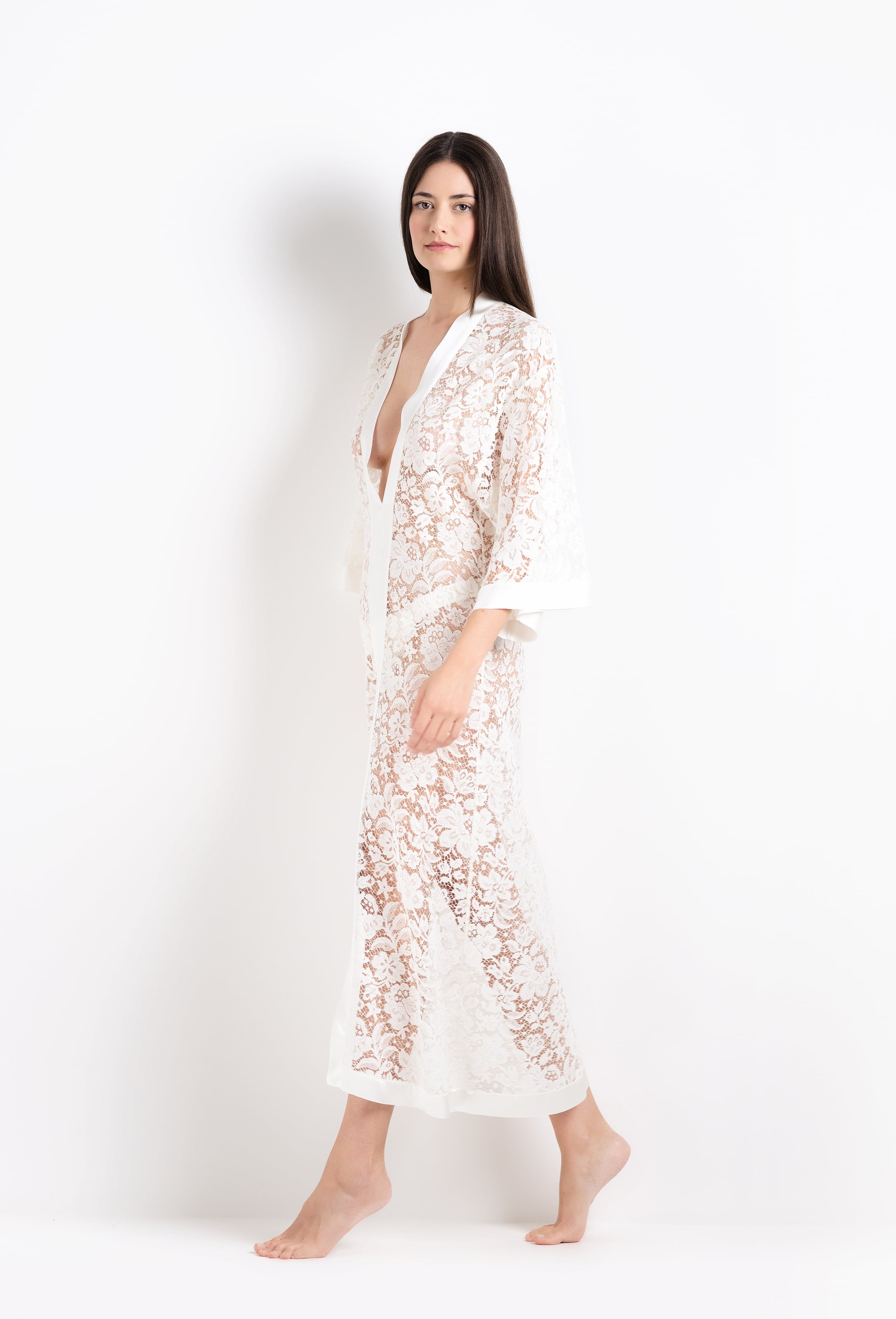 Discover the 2026 Cruise collection of lingerie couture from the house Carine Gilson with this long v neck kaftan in natural silk  with natural lace