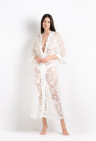 Discover the 2026 Cruise collection of lingerie couture from the house Carine Gilson with this long v neck kaftan in natural silk  with natural lace