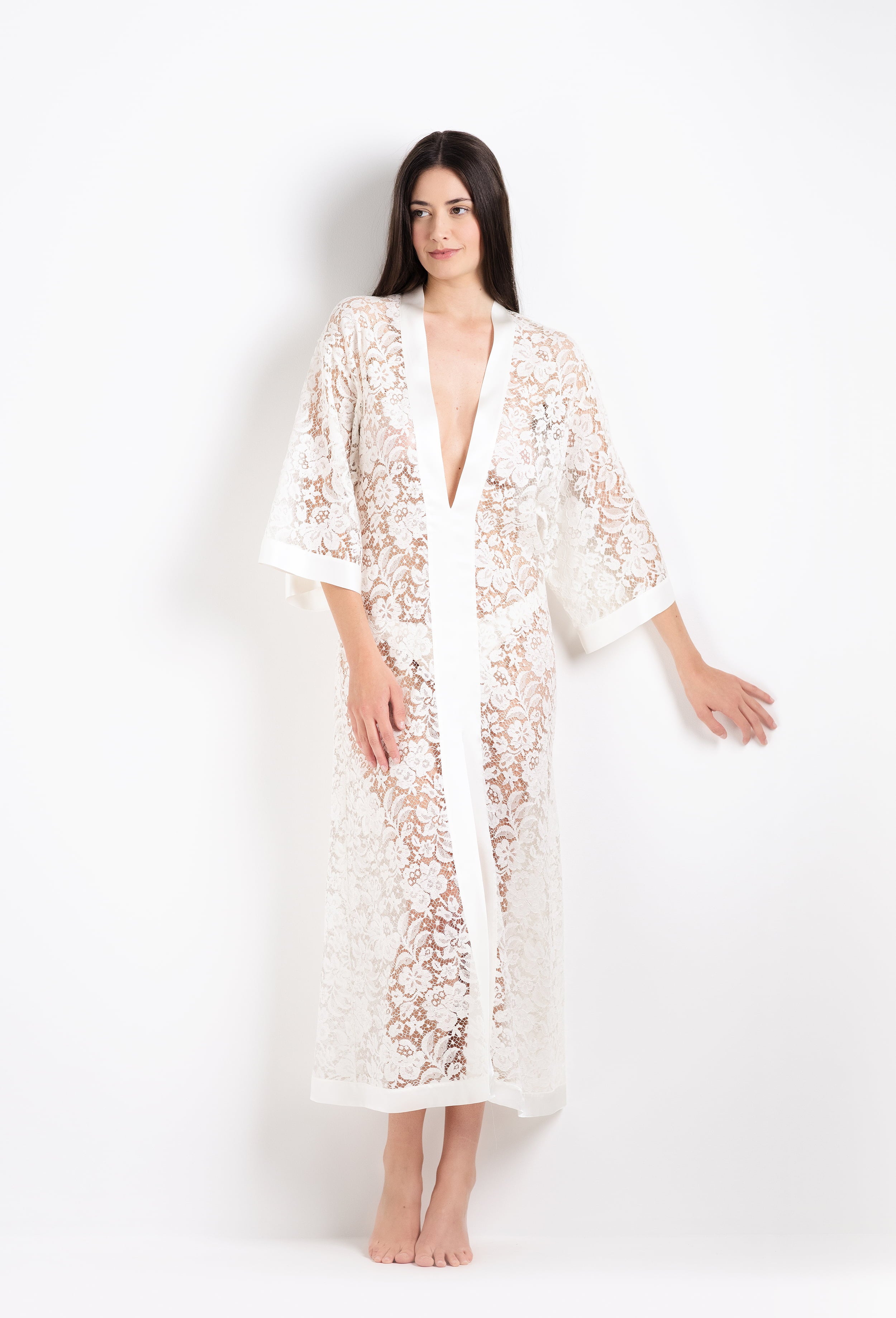Discover the 2026 Cruise collection of lingerie couture from the house Carine Gilson with this long v neck kaftan in natural silk  with natural lace