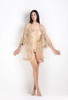 Discover the 2026 Summer collection of lingerie couture from the house Carine Gilson with this floaty shorts in mocha silk  with mocha lace