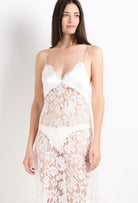 Enter Carine Gilson's world and the most beautiful silk collection with the 2026 Cruise collection with this long gown with cup in natural silk  with natural lace