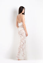 Enter Carine Gilson's world and the most beautiful silk collection with the 2026 Cruise collection with this long gown with cup in natural silk  with natural lace