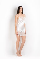 Made of silk and lace, explore the lingerie collection 2026 Cruise from the house Carine Gilson with this slip babydoll style straight neckline in natural silk  with natural lace