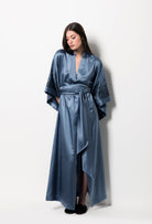 Discover the unique craftmanship of the belgian designer Carine Gilson in her atelier for the Winter 2026-27 collection with this Long Kimono Butterfly Sleeves in BlueStone print