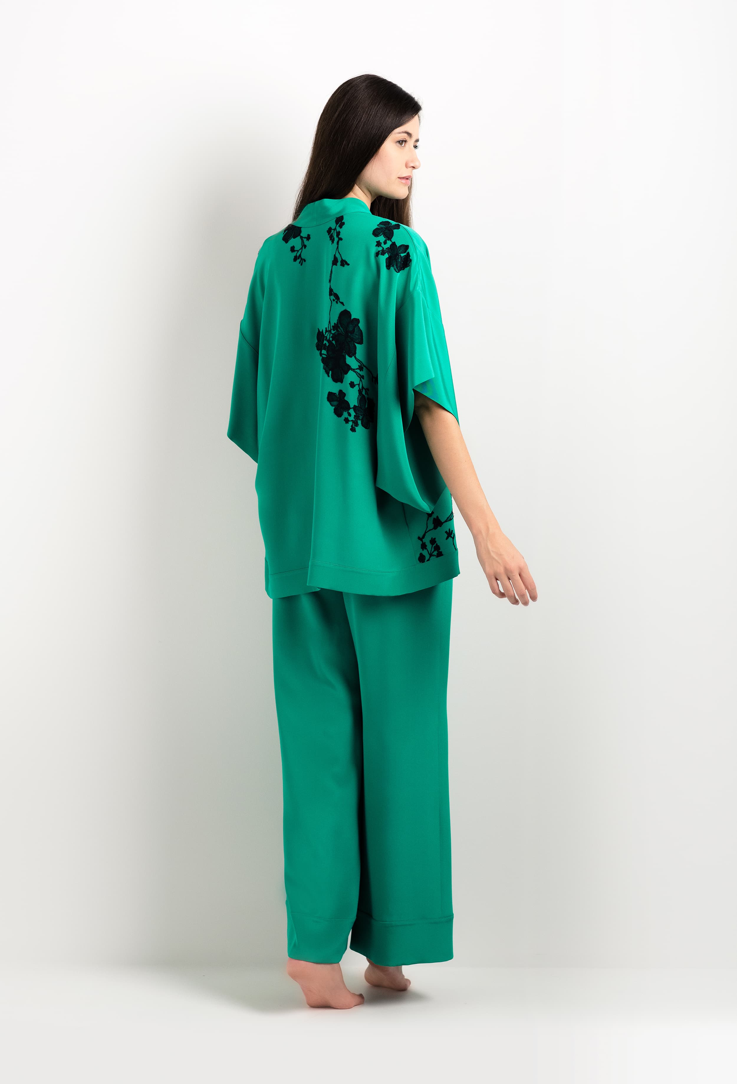 Made of silk and lace, explore the lingerie collection 2025 cruise from the house Carine Gilson with this Mini Kimono in Jade Green Silk  with Black lace