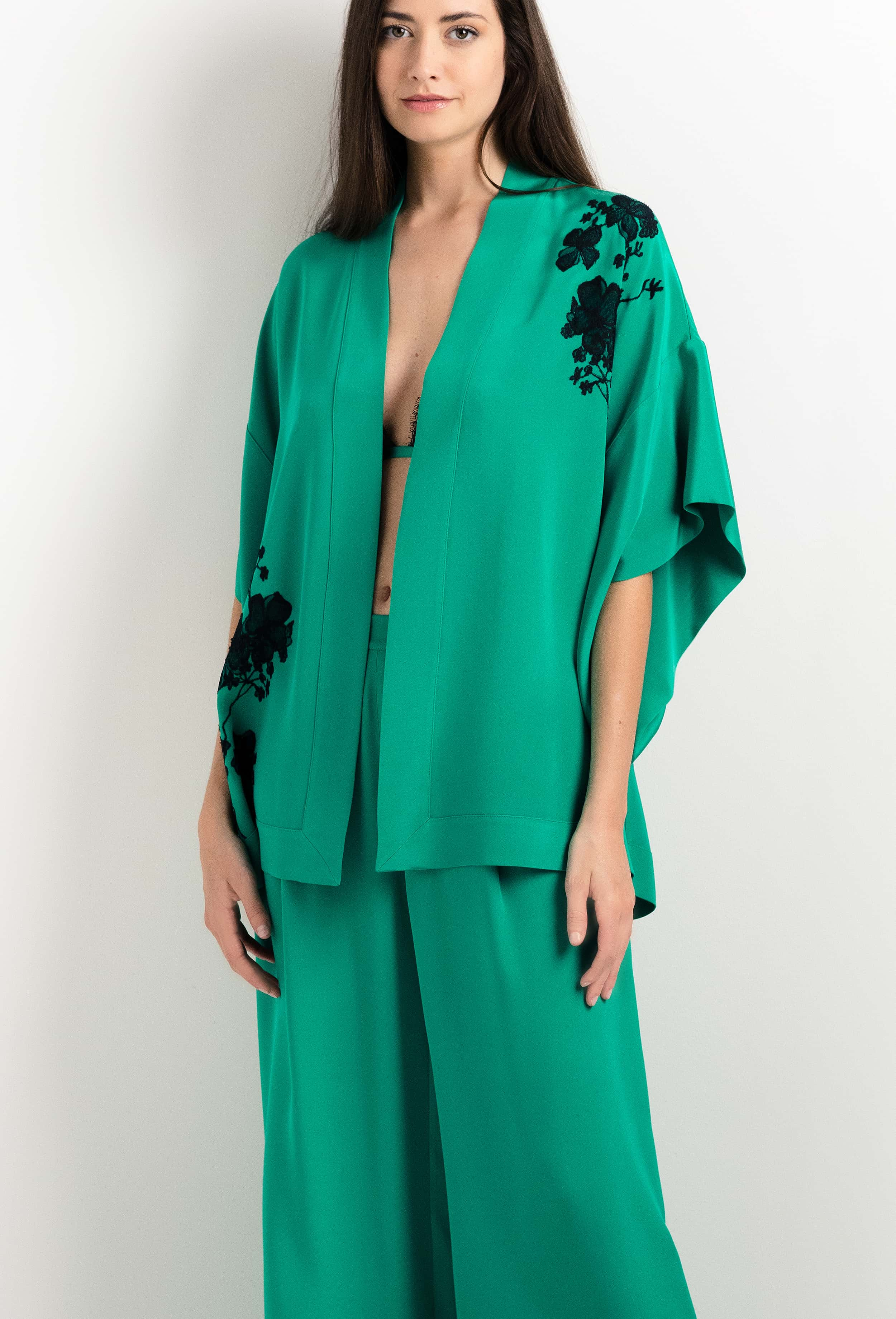 Made of silk and lace, explore the lingerie collection 2025 cruise from the house Carine Gilson with this Mini Kimono in Jade Green Silk  with Black lace