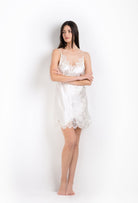 The 2026 Cruise collection from the house Carine Gilson - The most beautiful couture lingerie to be discovered with this slip babydoll style v neckline in natural silk  with natural lace