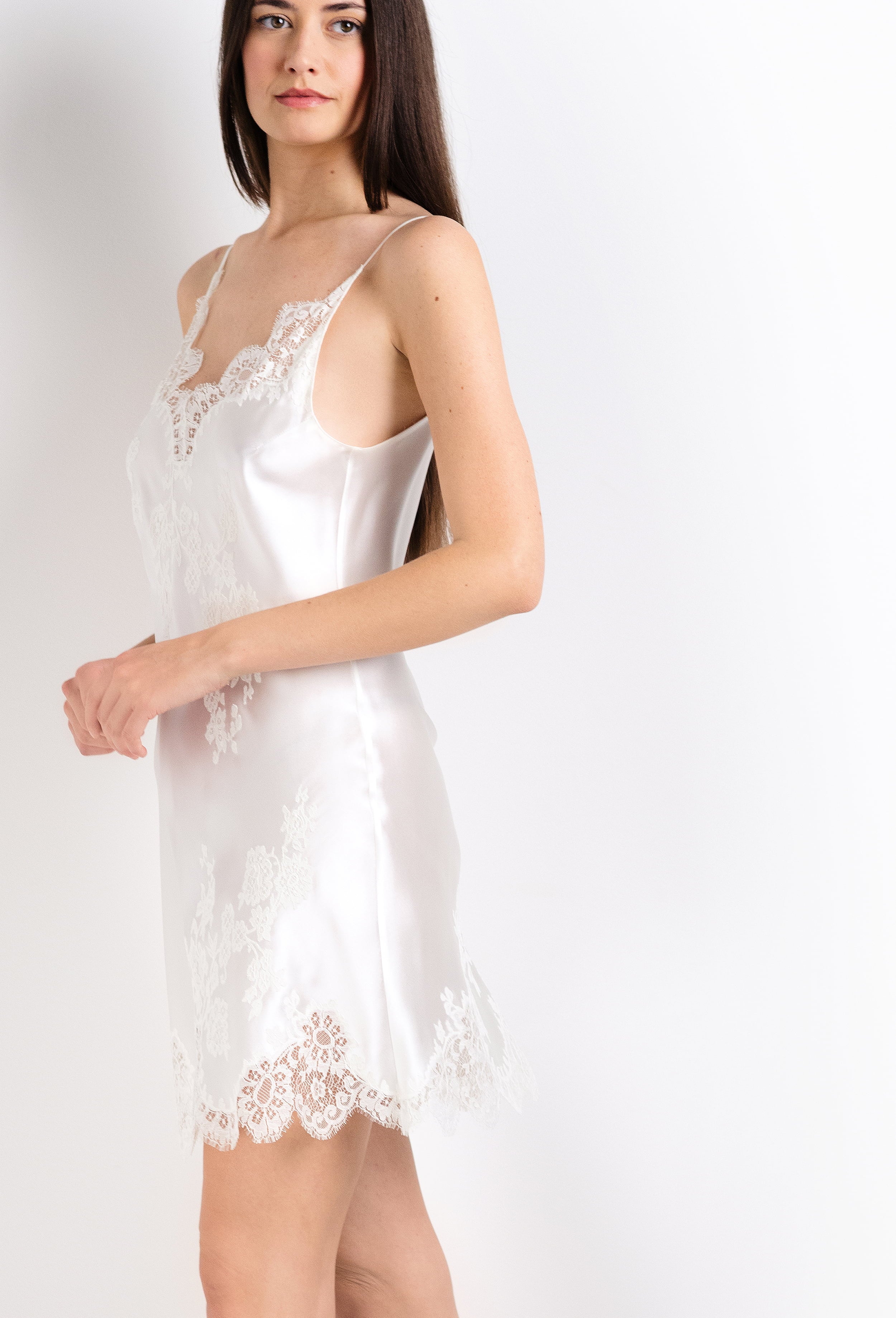 The 2026 Cruise collection from the house Carine Gilson - The most beautiful couture lingerie to be discovered with this slip babydoll style v neckline in natural silk  with natural lace