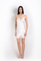 The 2026 Cruise collection from the house Carine Gilson - The most beautiful couture lingerie to be discovered with this slip babydoll style v neckline in natural silk  with natural lace