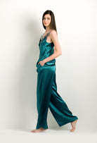 Enjoy the 2024 winter collection of lingerie couture from the house Carine Gilson with this Camisole V Neckline in blue Silk with emerald green lace