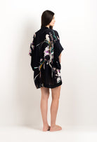 Enjoy the 2025 cruise collection of lingerie couture from the house Carine Gilson with this Short Kimono in Shadow of paradise Black Silk 