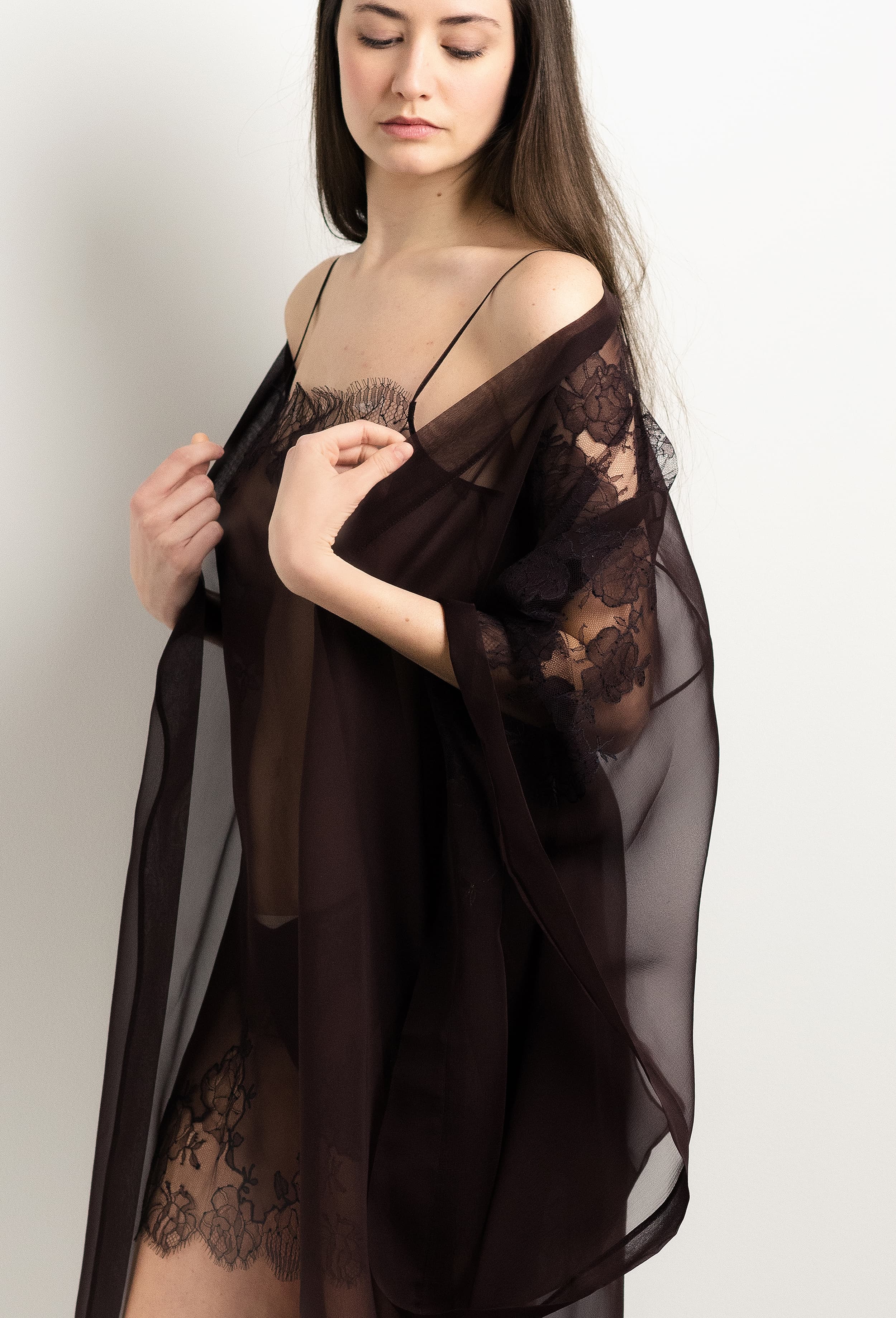 Discover the 2025 Winter collection of lingerie couture from the house Carine Gilson with this Long Kimono Butterfly Sleeves in Ebony Silk  with Ebony lace