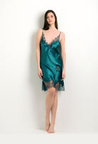 Discover the 2024 winter collection of lingerie couture from the house Carine Gilson with this Slip V Neckline in blue Silk with emerald green lace