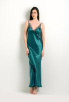 Enter Carine Gilson's world and the most beautiful silk lingerie with the 2024 winter collection and this Long Gown V Neckline in blue Silk with emerald green lace