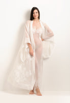 Discover the 2025 Summer collection of lingerie couture from the house Carine Gilson with this Long Kimono Butterfly Sleeves in Natural Silk  with Natural lace