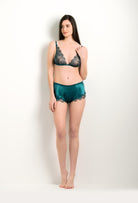 The 2024 winter collection from the house Carine Gilson - The most beautiful couture lingerie to be discovered with this Floaty Shorts in blue Silk with emerald green lace