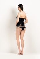 Discover the unique craftmanship of the belgian designer Carine Gilson in her atelier for the 2025 Winter collection with this Camisole V Neckline in Black Silk  with Vison lace
