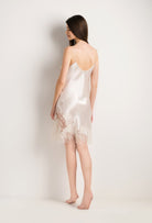 Enter Carine Gilson's world with the Summer 2022 collection and this Slip V Neckline in ivory Silk with ivory lace