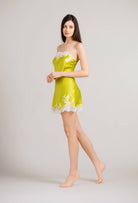 Enter Carine Gilson's world and the most beautiful silk lingerie with the 2024 summer collection and this silk Slip Babydoll Style in Anise green with lace