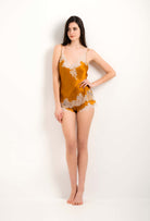 Enter Carine Gilson's world with the 2023 summer collection and this Camisole V Neckline in gold amber Silk with ivory lace