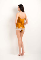 Enter Carine Gilson's world with the 2023 summer collection and this Camisole V Neckline in gold amber Silk with ivory lace