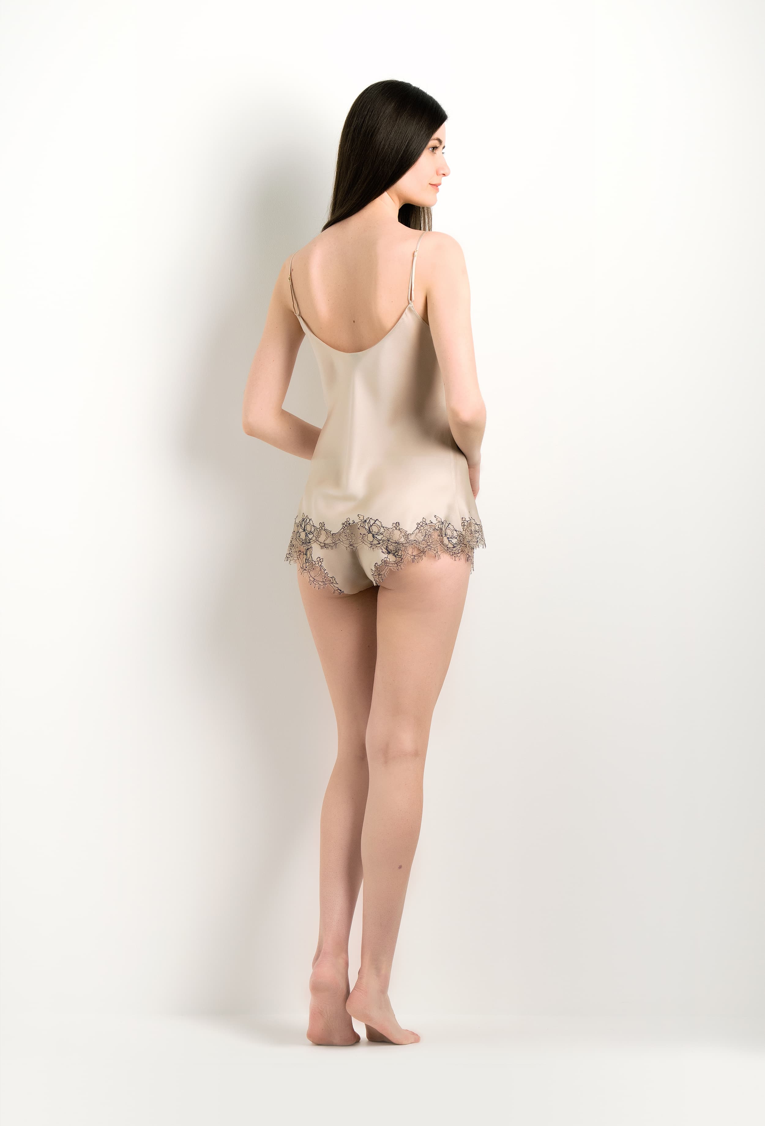 Enter Carine Gilson's world and the most beautiful silk lingerie with the 2024 winter collection and this Camisole V Neckline in sand beige Silk with Beige Navy lace